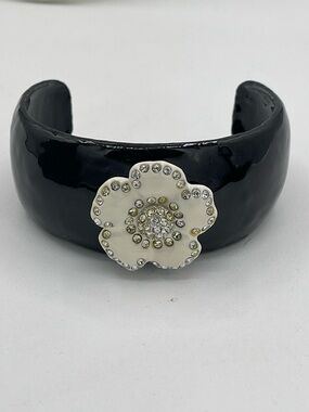 4.21.26-4 Black Enameled Cuff Bracelet with White Crystal Flower Accent